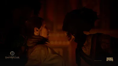 A snarling vampire lunges at a woman in a dark firelit room